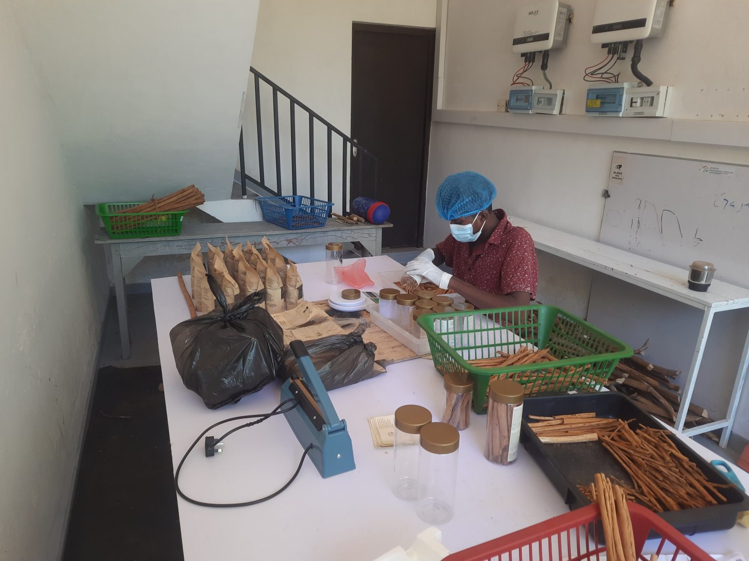 Kurunda team member preparing cinnamon products